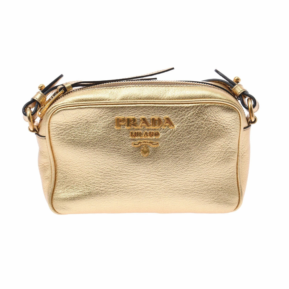 Prada Milano camera bag metallic gold prominent logo emblem